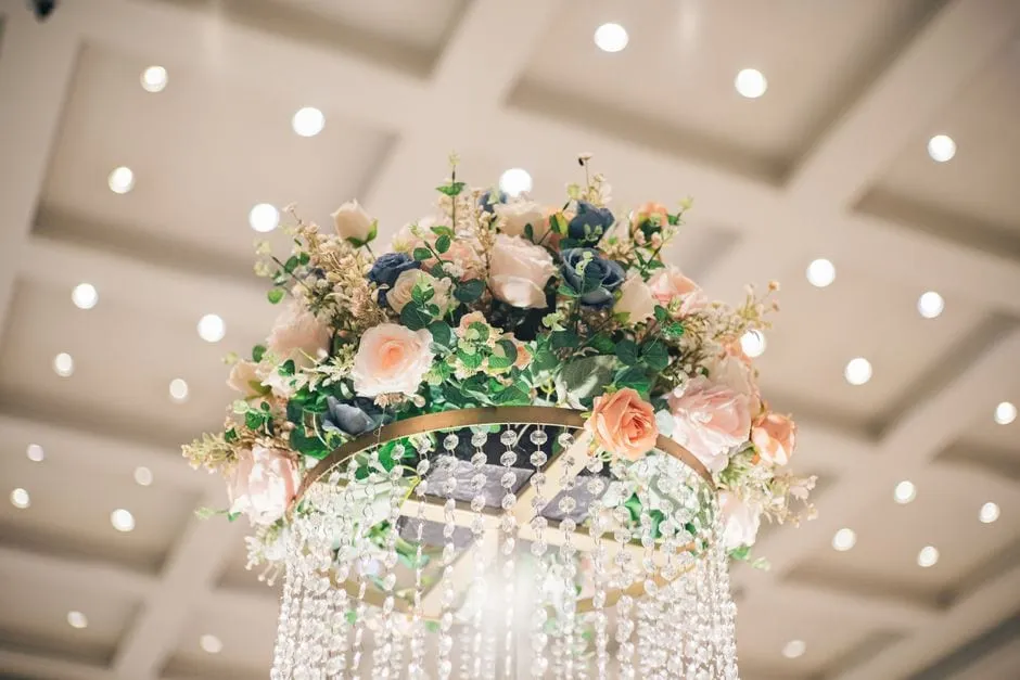A hanging floral arrangement of trailing blooms and foliage